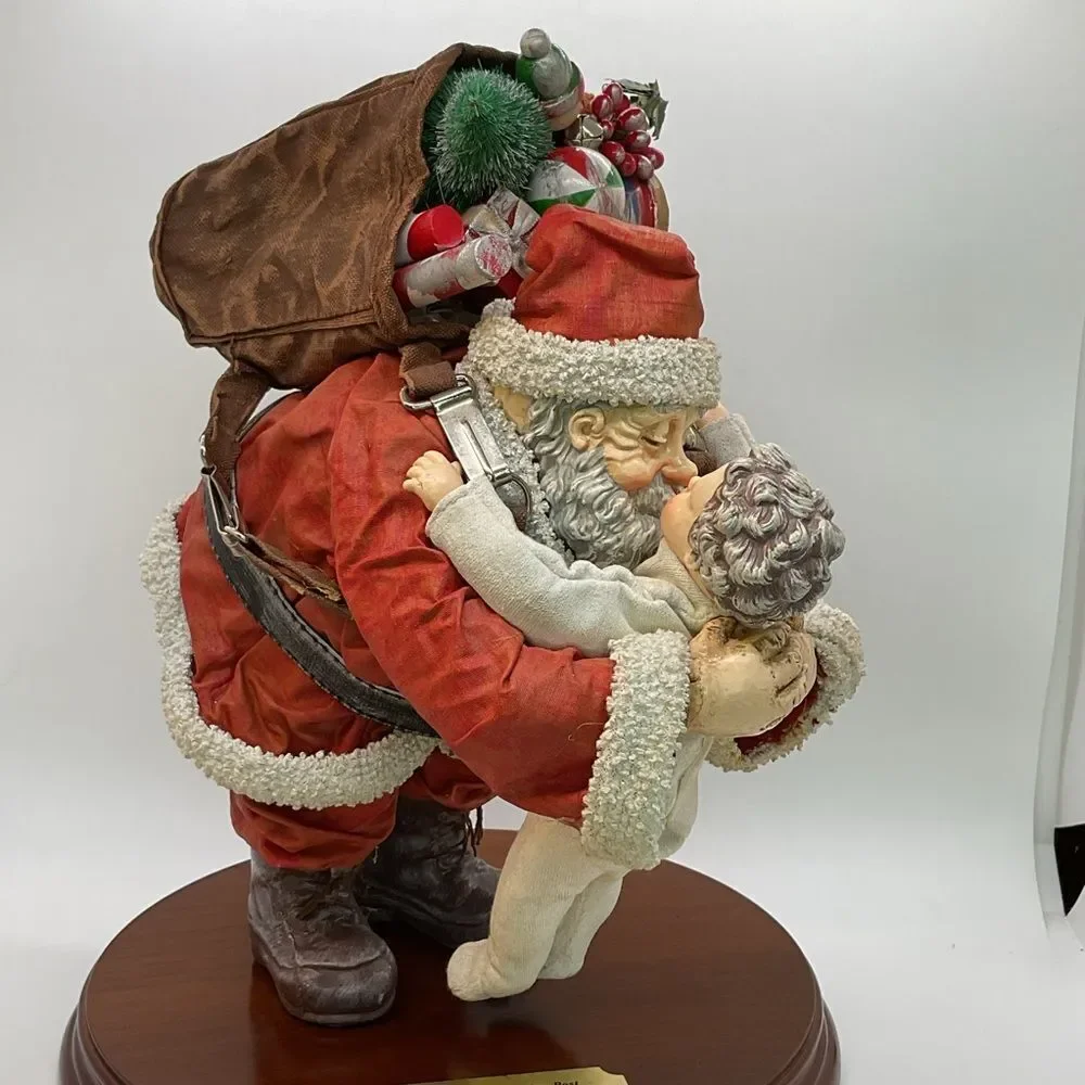 Clothtique Santa and Child Sculpture - Saturday Evening Post